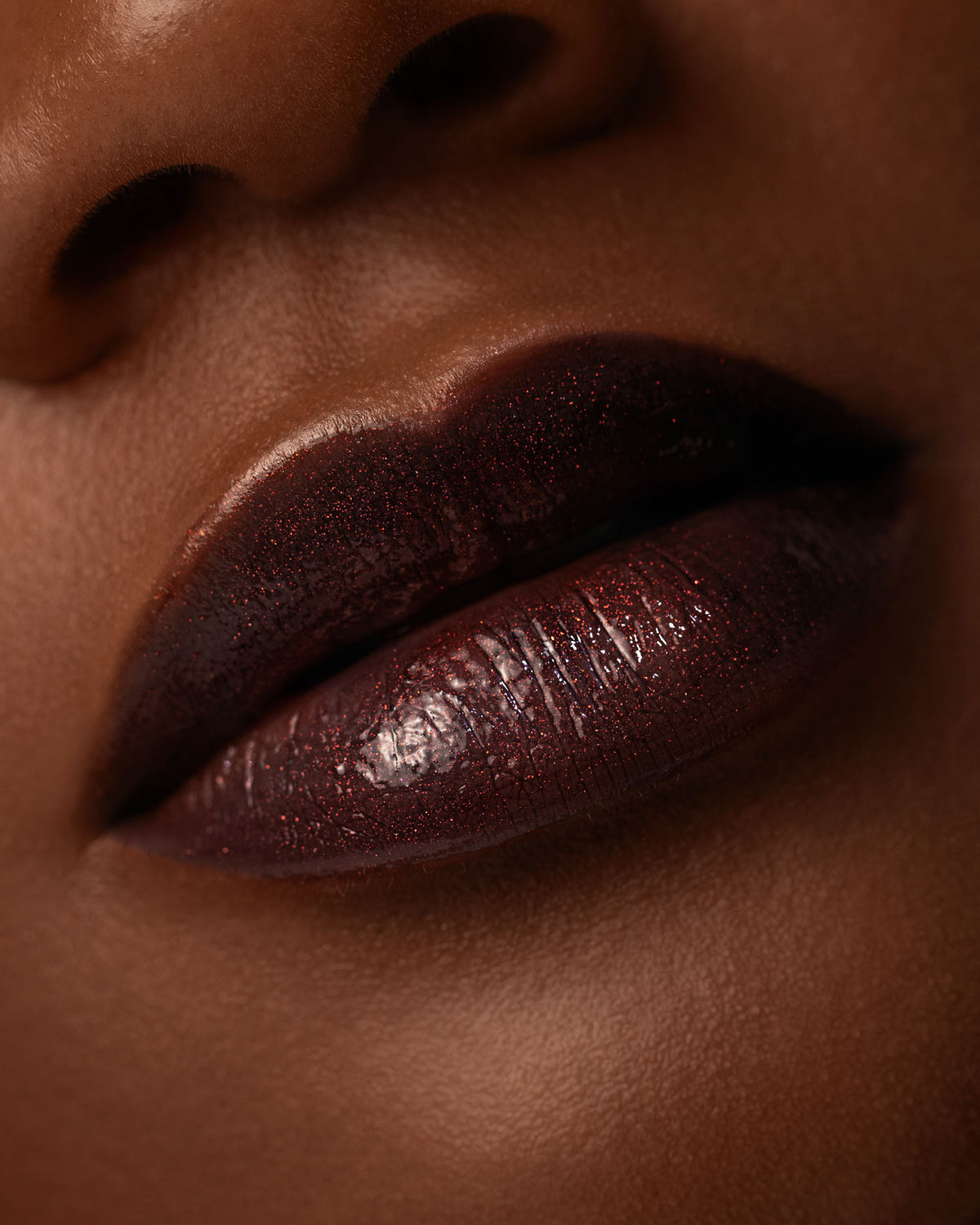 Close-up lip macro of Night Flower Thorn Bite lip oil