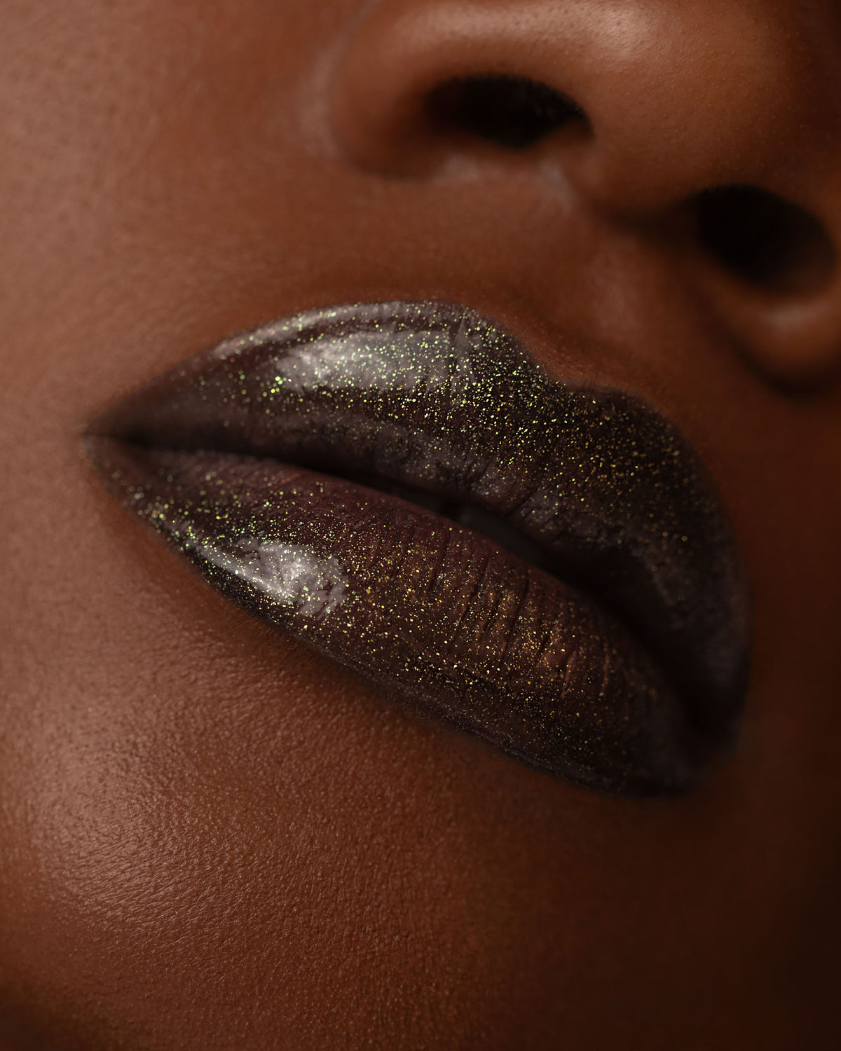 Close-up lip macro of Night Glow Thorn Bite lip oil