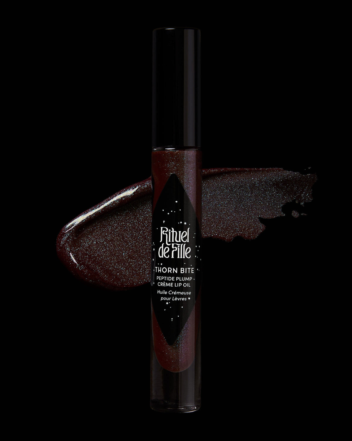 Lip gloss with brand name on a black background