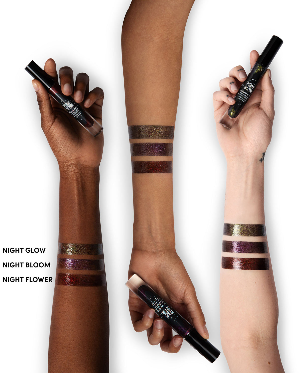 Arm swatches of Chroma Obscura Thorn Bite lip oil shades